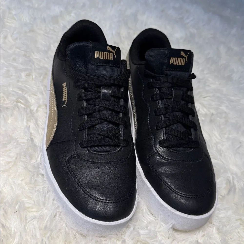 Puma Black Sneakers with Gold Highlights